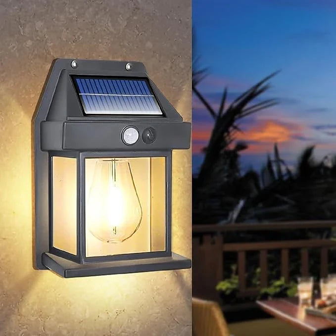 Solar wall light glowing at night